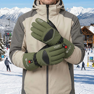 A Man Wearing A Pair Green Rechargeable Heated Ski Gloves