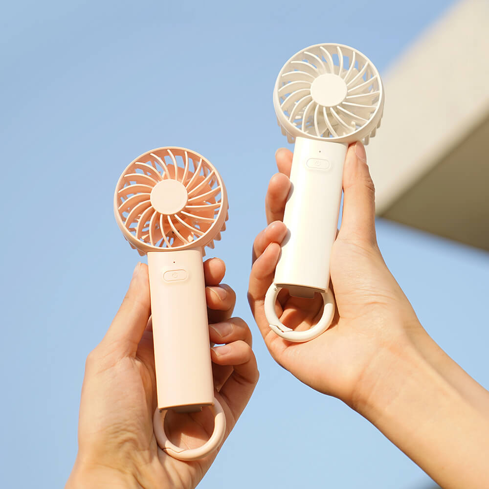 Ultra-quiet mini handheld fan in white with 3-speed settings and carabiner clip